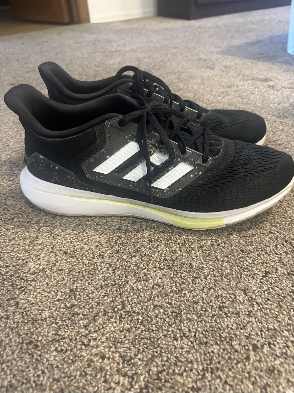 adidas Black Running Shoes with White Stripes and Yellow Accent